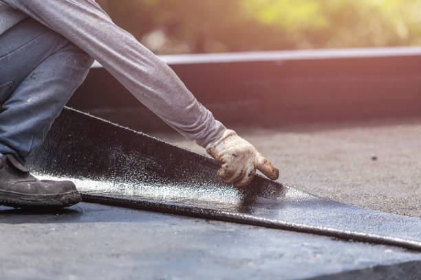 Professional Basement Waterproofing technician working in Silver Lake, NY